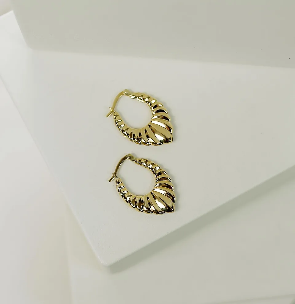 スカルプチャー ピアス
